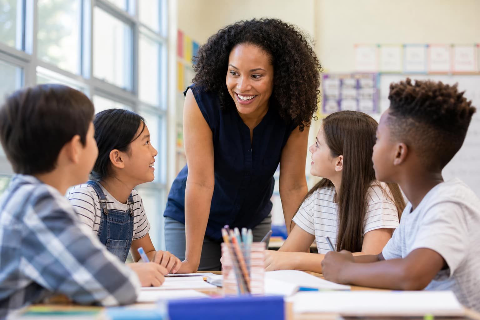 Teacher inspiring students in the classroom